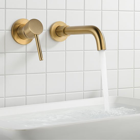 mitigeur mural lavabo dore